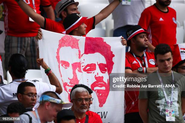 An Egypt fan holds a banner of Mo Salah prior to the 2018 FIFA World Cup Russia group A match between Saudi Arabia and Egypt at Volgograd Arena on...