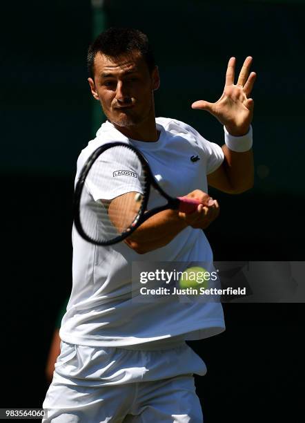 Bernard Tomic of Australia in action against Matteo Donati of Italy during the Wimbledon Lawn Tennis Championships Qualifying at The Bank of England...