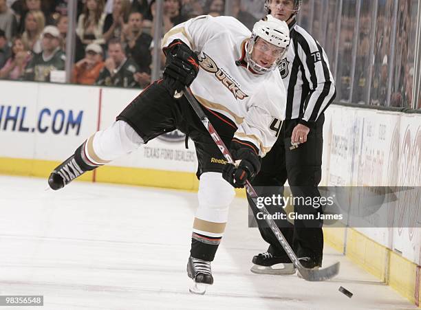 Aaron Ward of the Anaheim Ducks makes a pass to a teammate against the Dallas Stars on April 8, 2010 at the American Airlines Center in Dallas, Texas.