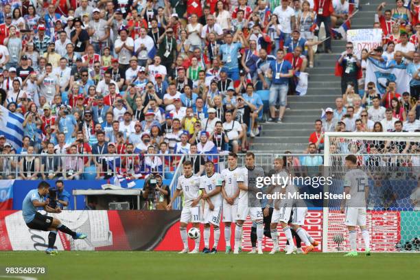 Luis Suarez of Uruguay scores his team's first goal during the 2018 FIFA World Cup Russia group A match between Uruguay and Russia at Samara Arena on...