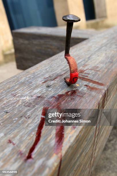 The detail of cross, showing the crucifixion of Jesus Christ is pictured ahead of a passion play rehearsal on April 9, 2010 in Oberammergau, Germany....