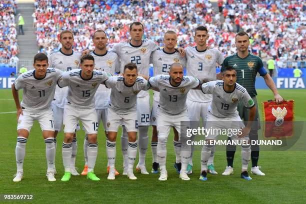 Russia's midfielder Yuri Gazinskiy, Russia's defender Sergey Ignashevich, Russia's forward Artem Dzyuba, Russia's defender Igor Smolnikov, Russia's...