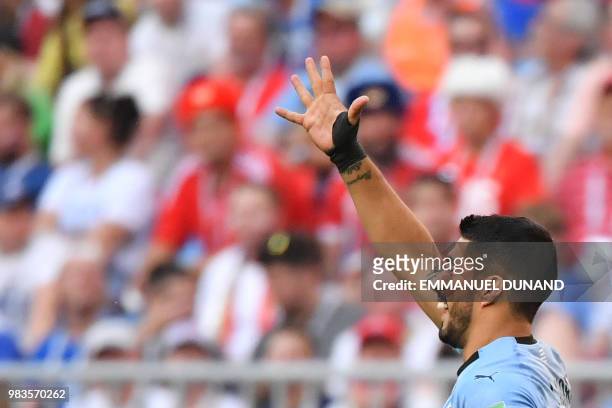 Uruguay's forward Luis Suarez celebrates after scoring a goal during the Russia 2018 World Cup Group A football match between Uruguay and Russia at...