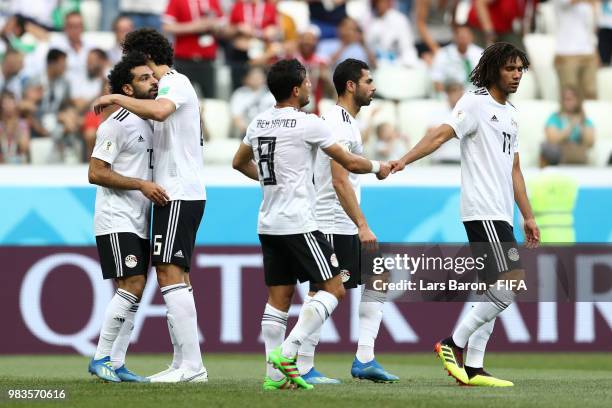 Mohamed Salah of Egypt celebrates with teammate Ahmed Hegazy after scoring his team's first goal during the 2018 FIFA World Cup Russia group A match...