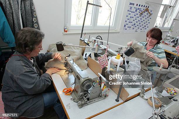 Sewers of passion play theatre manufacture costumes on April 9, 2010 in Oberammergau, Germany. The Oberammergau Passion play, first staged in 1634 to...