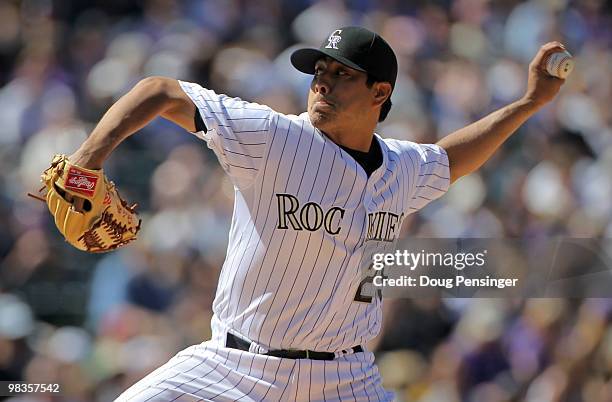 Starting pitcher Jorge De La Rosa of the Colorado Rockies delivers against the San Diego Padres during MLB action on Opening Day at Coors Field on...