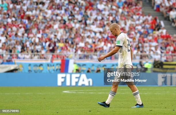 Igor Smolnikov of Russia walks off dejected after being sent off during the 2018 FIFA World Cup Russia group A match between Uruguay and Russia at...