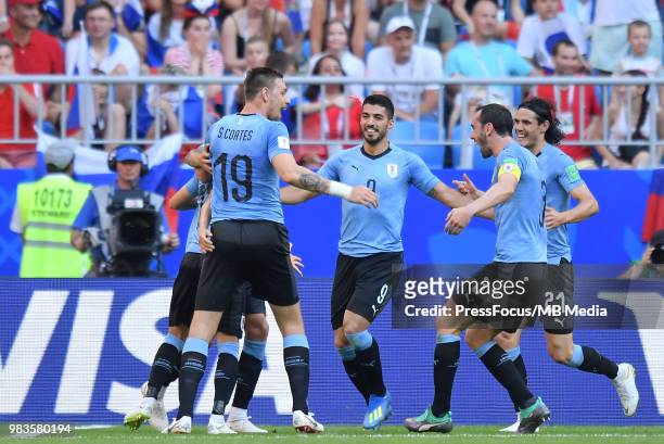 Sebastian Coates, Luis Suarez, Edinson Cavani, Diego Godin of Uruguay celebrate scoring a goal during the 2018 FIFA World Cup Russia group A match...