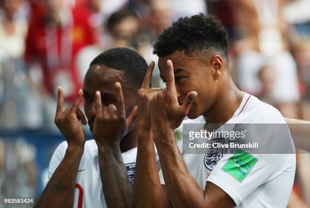 Jesse Lingard of England celebrates after scoring his team's third goal with team mate Raheem Sterling during the 2018 FIFA World Cup Russia group G...