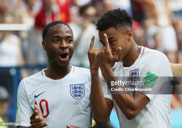 Jesse Lingard of England celebrates after scoring his team's third goal with team mate Raheem Sterling during the 2018 FIFA World Cup Russia group G...