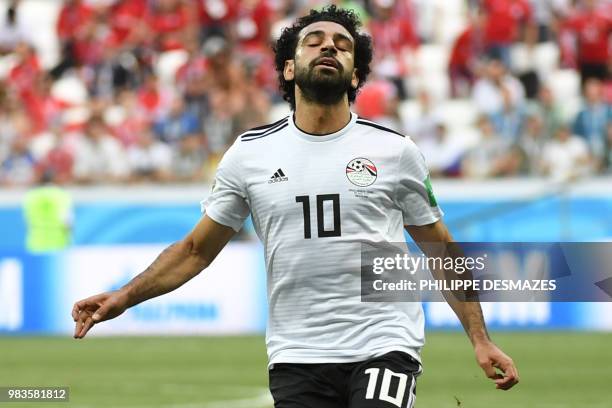 Egypt's forward Mohamed Salah reacts during the Russia 2018 World Cup Group A football match between Saudi Arabia and Egypt at the Volgograd Arena in...