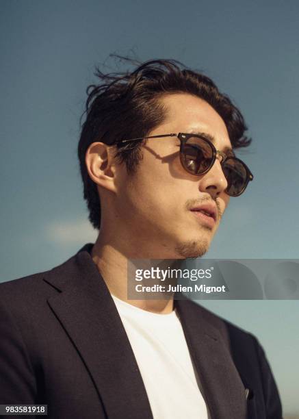 Actor Steven Yeun is photographed for Grazia Daily, on May, 2018 in Cannes, France. . .