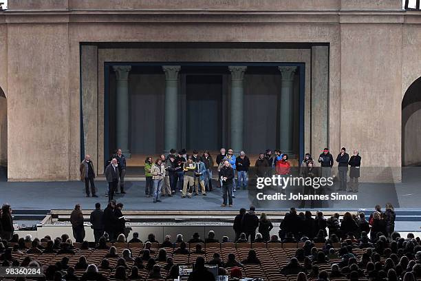 Villagers of Oberammergau, performing on stage as contemporaries of Jesus Christ, participate in a passion play rehearsal on April 9, 2010 in...