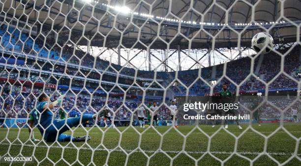 Salman Alfaraj of Saudi Arabia scores a penalty for his team's first goal past Essam El Hadary of Egypt during the 2018 FIFA World Cup Russia group A...