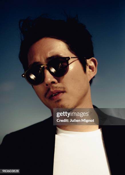 Actor Steven Yeun is photographed for Grazia Daily, on May, 2018 in Cannes, France. . .