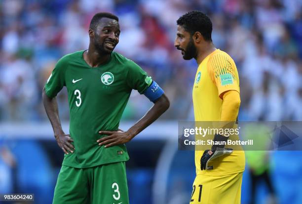 Abdullah Almuaiouf talks with Yasser Almosailem of Saudi Arabia during the 2018 FIFA World Cup Russia group A match between Saudia Arabia and Egypt...