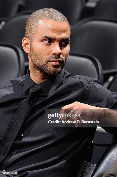 Tony Parker of the San Antonio Spurs sits on the bench before the game against the Cleveland Cavaliers on March 26, 2010 at the AT&T Center in San...