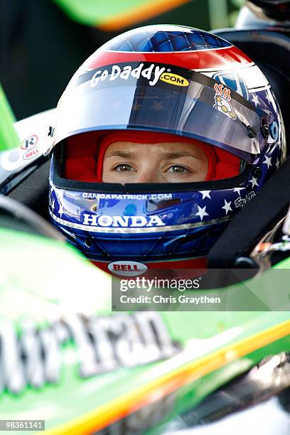 Danica Patrick, driver of the Team GoDaddy.com Andretti Autosport Dallara Honda sits in her car during practice for the IRL IndyCar Series Grand Prix...