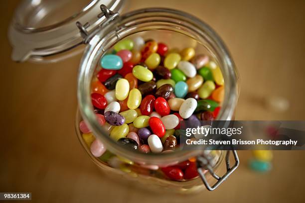 jelly beans in a jar - jelly beans stock pictures, royalty-free photos & images