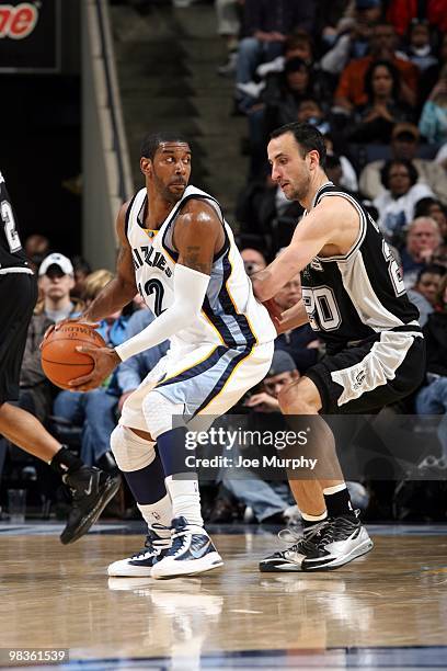 Mayo of the Memphis Grizzlies looks to make a move against Manu Ginobili of the San Antonio Spurs during the game at the FedExForum on March 6, 2010...
