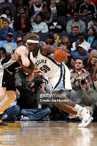 Zach Randolph of the Memphis Grizzlies makes a move against Matt Bonner of the San Antonio Spurs during the game at the FedExForum on March 6, 2010...