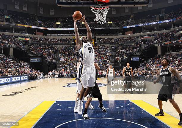 Zach Randolph of the Memphis Grizzlies rebounds during the game against the San Antonio Spurs at the FedExForum on March 6, 2010 in Memphis,...