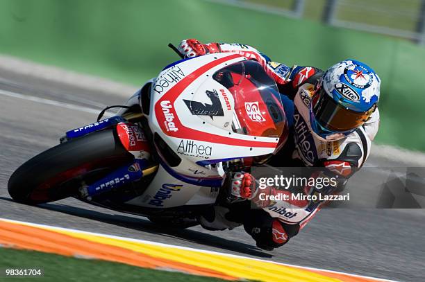 Carlos Checa of Spain and Althea Racing rounds the bend during the first qualifying session at Comunitat Valenciana Ricardo Tormo Circuit on April 9,...