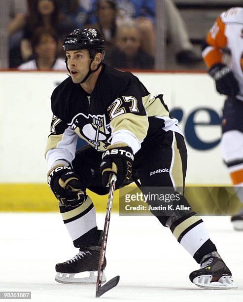 Craig Adams of the Pittsburgh Penguins skates against the New York Islanders at Mellon Arena on April 8, 2010 in Pittsburgh, Pennsylvania. The...