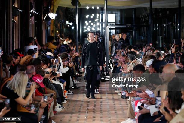 Model walks the runway during the White Mountaineering Menswear Spring/Summer 2019 show as part of Paris Fashion Week on June 23, 2018 in Paris,...