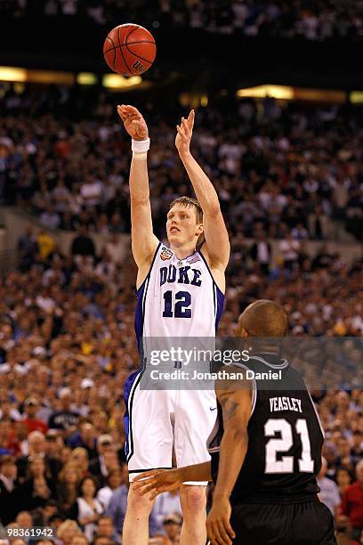 Kyle Singler of the Duke Blue Devils attempts a shot in the second half against the Butler Bulldogs during the 2010 NCAA Division I Men's Basketball...