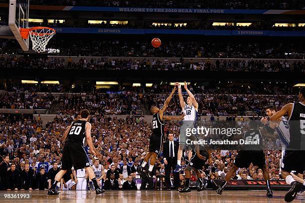 Kyle Singler of the Duke Blue Devils attempts a shot in the second half against the Butler Bulldogs during the 2010 NCAA Division I Men's Basketball...