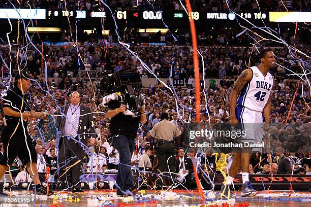 Cameraman operates a Fusion 3D camera rig as he films Lance Thomas of the Duke Blue Devils celebrate after Duke won 61-59 against the Butler Bulldogs...