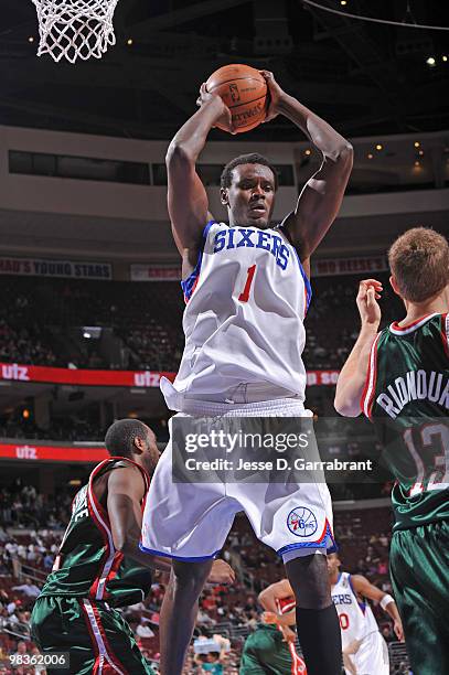 Samuel Dalembert of the Philadelphia 76ers grabs the rebound against the Milwaukee Bucks during the game on April 9, 2010 at the Wachovia Center in...