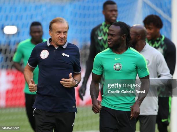 Gernot Rohr coach of Nigeria talk with Victor Moses of Nigeria during Team Nigeria field scouting at Zenit Arena onJune 25, 2018 in Saint Petersburg,...