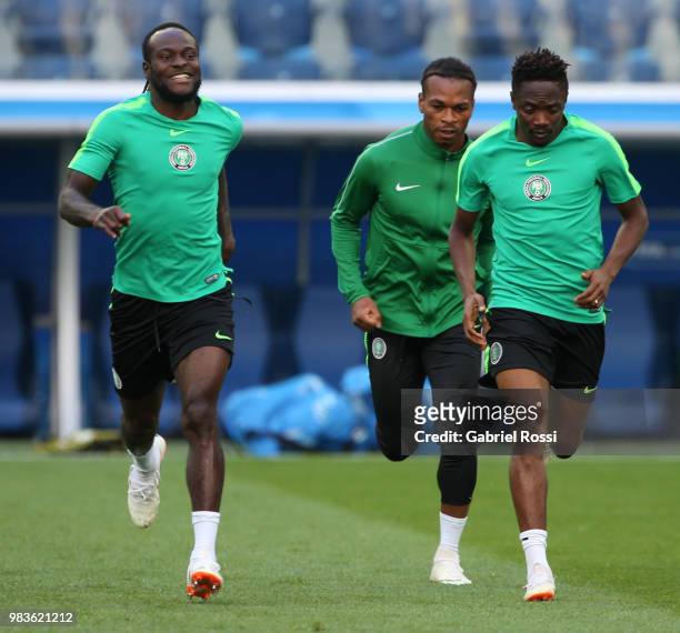 Victor Moses of Nigeria and teammates warm up during Team Nigeria field scouting at Zenit Arena onJune 25, 2018 in Saint Petersburg, Russia.