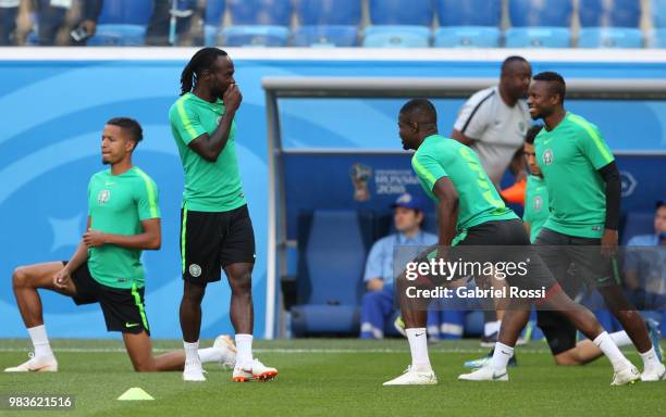 Victor Moses of Nigeria and teammates warm up during Team Nigeria field scouting at Zenit Arena onJune 25, 2018 in Saint Petersburg, Russia.