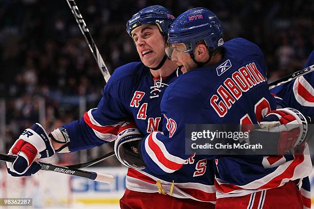 Marian Gaborik of the New York Rangers celebrates scoring a goal with team mate Brandon Dubinsky against the Philadelphia Flyers during their game on...