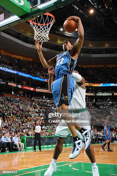 James Singleton of the Washington Wizards grabs the rebound against Glen Davis of the Boston Celtics on April 9, 2010 at the TD Garden in Boston,...
