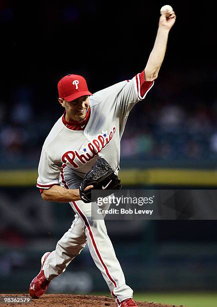 Happ of the Philadelphia Phillies throws against the Houston Astros in the first inning at Minute Maid Park on April 9, 2010 in Houston, Texas.