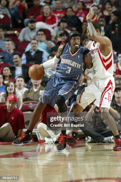 Gerald Wallace of the Charlotte Bobcats posts up against Trevor Ariza of the Houston Rockets on April 9, 2010 at the Toyota Center in Houston, Texas....