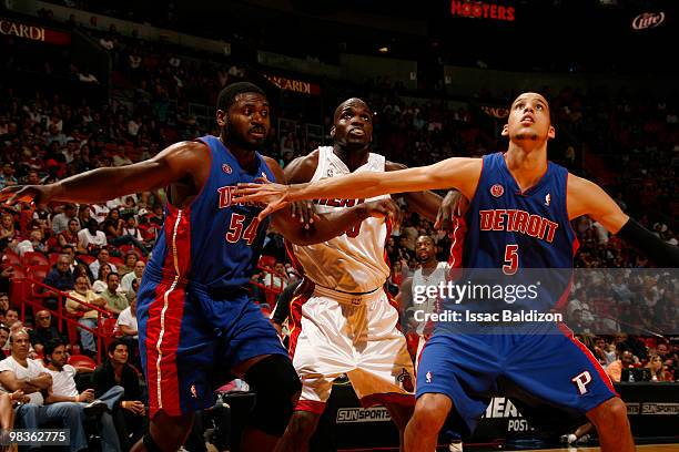 Austin Daye of the Detroit Pistons battles for a rebound against Joel Anthony of the Miami Heat on April 9, 2010 at American Airlines Arena in Miami,...