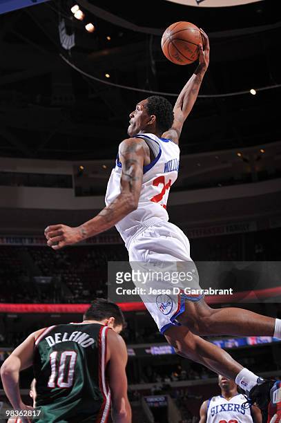 Lou Williams of the Philadelphia 76ers shoots against Carlos Delfino of the Milwaukee Bucks during the game on April 9, 2010 at the Wachovia Center...