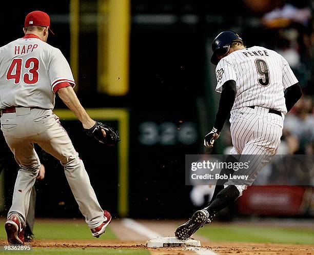 Hunter Pence of the Houston Astros beats pitcher J.A. Happ to the base on an infield hit in the first inning at Minute Maid Park on April 9, 2010 in...