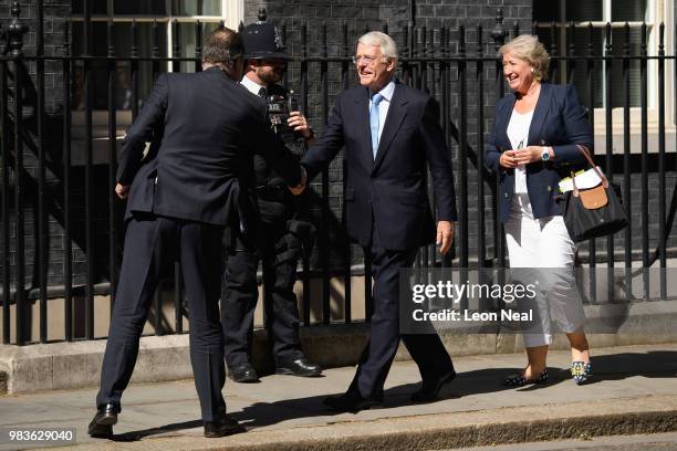 Former British Prime Minister John Major is greeted as he arrives at Downing Street on June 25, 2018 in London, England.