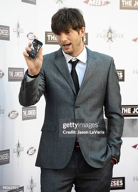 Actor Ashton Kutcher attends the premiere of "The Joneses" at ArcLight Cinemas on April 8, 2010 in Hollywood, California.