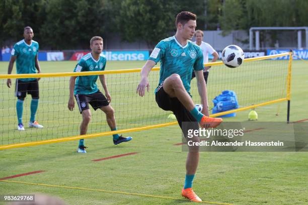 Julian Draxler of Germany battles for the ball during a football tennis match of the Germany Training Session at ZSKA Vatutinki Sportarena on June...