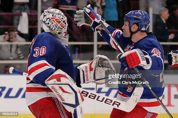Henrik Lundqvist of the New York Rangers celebrates victory with team mate Jody Shelley against the Philadelphia Flyers during their game on April 9,...
