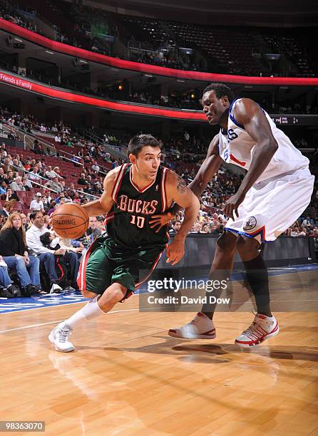 Carlos Delfino of the Milwaukee Bucks drives against Samuel Dalembert of the Philadelphia 76ers during the game on April 9, 2010 at the Wachovia...