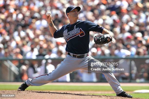 Tim Hudson of the Atlanta Braves pitches against the San Francisco Giants in the first inning on Opening Day at AT&T Park on April 9, 2010 in San...