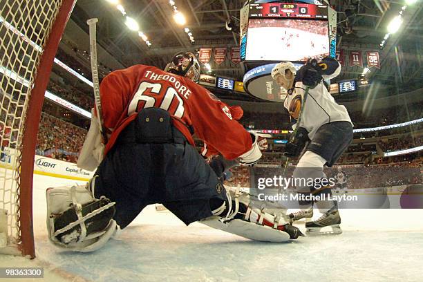 Jose Theodore of the Washington Capitals makes a save on a shot by Colby Armstrong of the Atlanta Thrashers during a NHL hockey game on April 9, 2010...